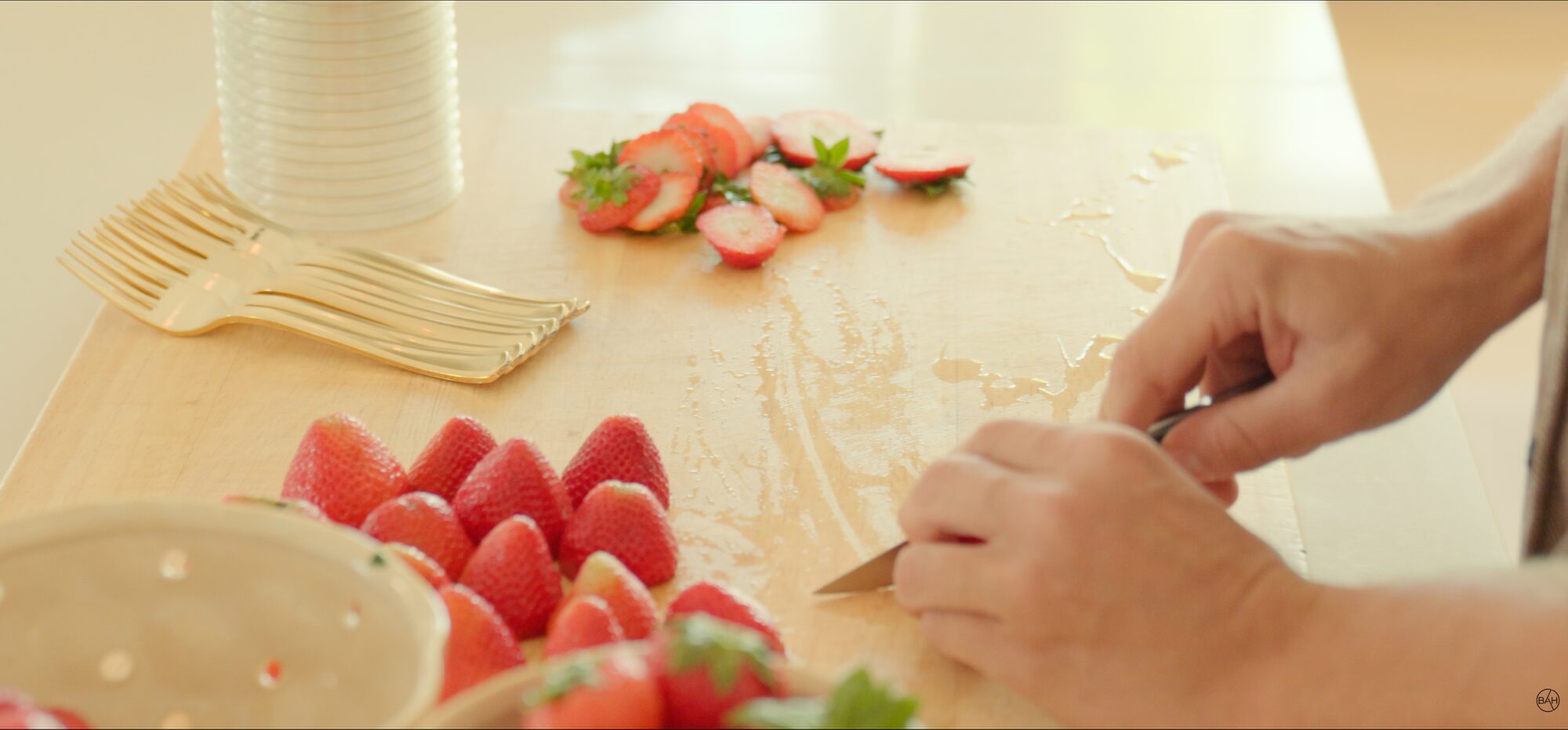 Cutting board with sliced strawberries